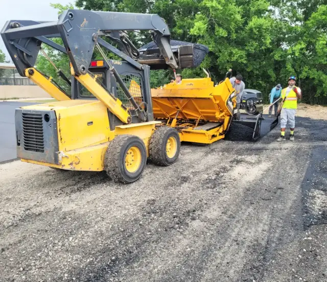 Wright's Paving in Kaufman, TX, preparing a site for asphalt paving.