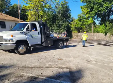 Wright's Paving prepares a site for paving.