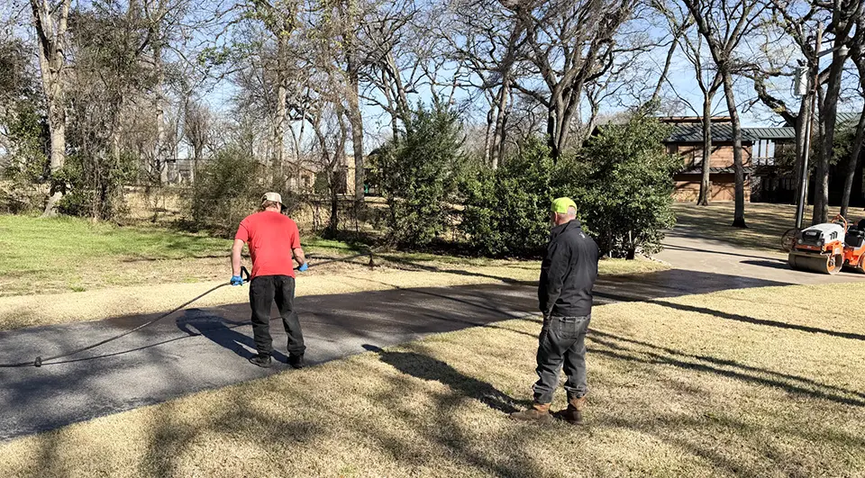 Sealcoating a customer's driveway