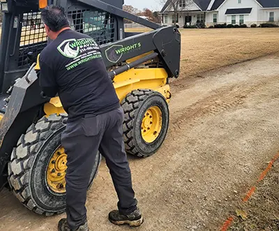 Preparing a site for paving.